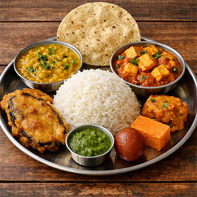 ভাত + ভেজ ডাল + বেগুনী + ছানার ডালনা / পনির + চাটনি + পাঁপড় + মিষ্টি